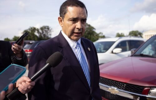 Rep. Henry Cuellar (D-Texas) speaks with reporters as he departs the U.S. Capitol May 7.