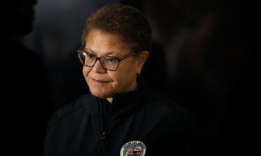 Los Angeles Mayor Karen Bass waits to speak during a news conference in Los Angeles
