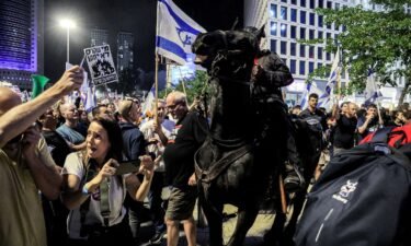 Israeli mounted police are deployed during a rally calling for the release of hostages held in Gaza outside the defense ministry headquarters in Tel Aviv on May 11.