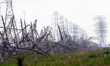 Down power lines are shown in the aftermath of a severe thunderstorm in Cypress