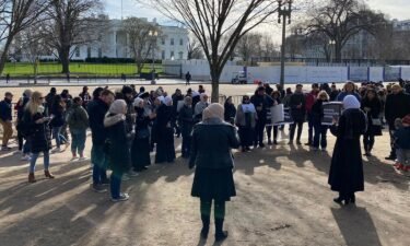 A vigil is held outside of the White House on February 17 to mark three years since Majd Kamalmaz's detention in Syria.