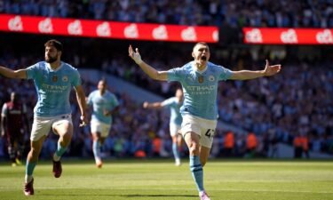 Phil Foden celebrates after scoring the opening goal for Manchester City.