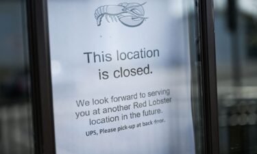 A "location closed" sign hangs in the window of a closed Red Lobster restaurant in Torrance