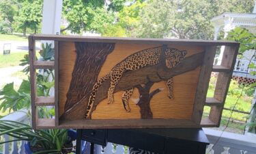 Chuck Perkins's 1980 carving of a cheetah went on a long journey to find its way home.