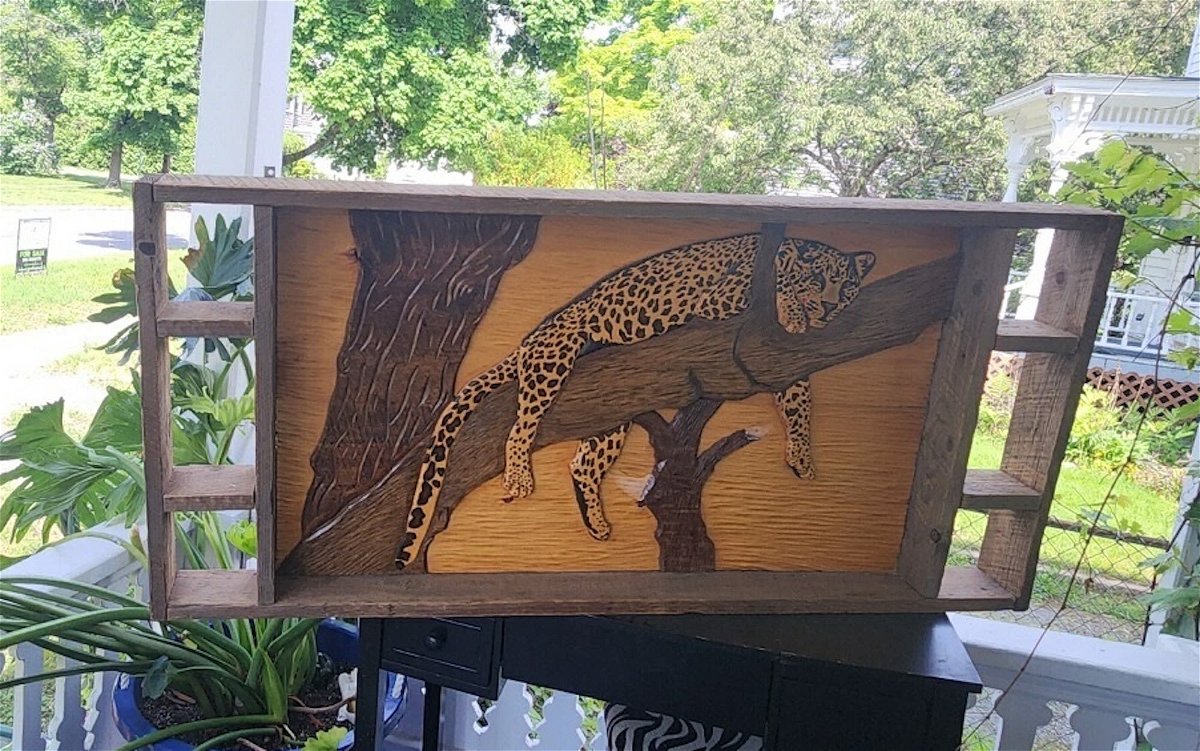 <i>Courtesy Celia Bashaw via CNN Newsource</i><br/>Chuck Perkins's 1980 carving of a cheetah went on a long journey to find its way home.