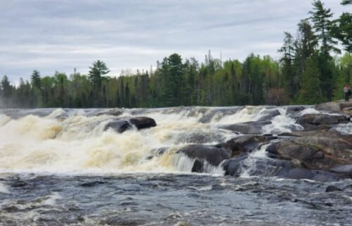 Rescuers camped overnight to continue their efforts to locate the two people who went missing while canoeing in northern Minnesota.