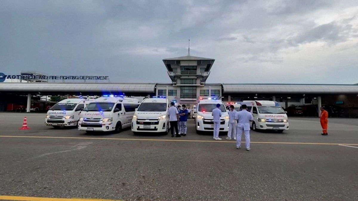 <i>Pongsak Suksi/Reuters via CNN Newsource</i><br/>Emergency personnel are seen at a Bangkok airport following a Singapore Airlines plane making an emergency landing due to turbulence.
