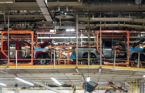 Trucks are lined up on the assembly line at Nissan's Canton Vehicle Assembly Plant