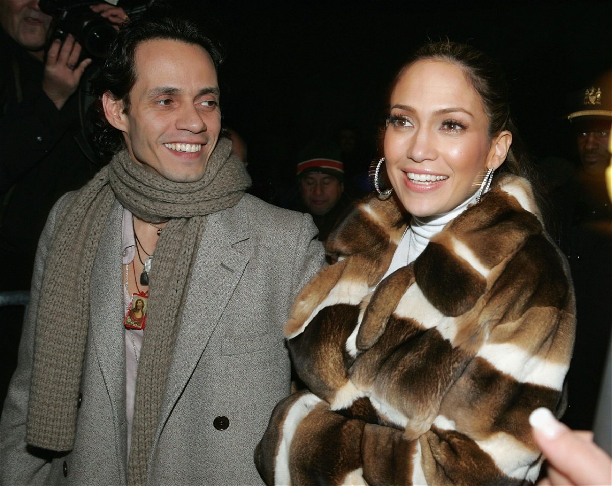 <i>Paul Hawthorne/Getty Images via CNN Newsource</i><br/>Jennifer Lopez stands with Marc Anthony in 2005.