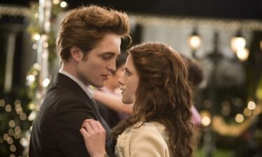 Robert Pattinson and Kristen Stewart as Edward and Bella