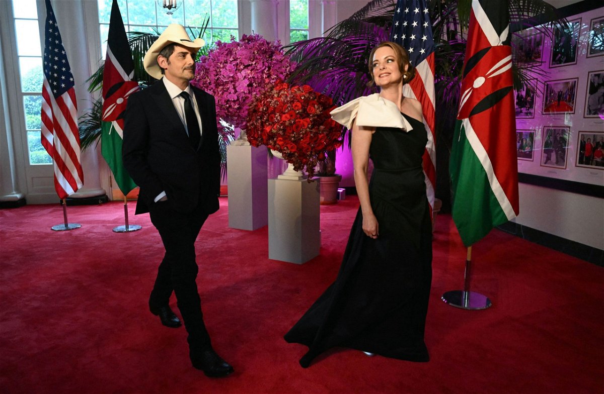 <i>Saul Loeb/AFP/Getty Images via CNN Newsource</i><br/>Country star Brad Paisley and his wife actress Kimberly Williams-Paisley arrive at the Booksellers Room of the White House on the occasion of the State Dinner with the Kenyan president at the White House in Washington
