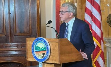 Ohio Gov. Mike DeWine speaks from the statehouse in Columbus on May 23.