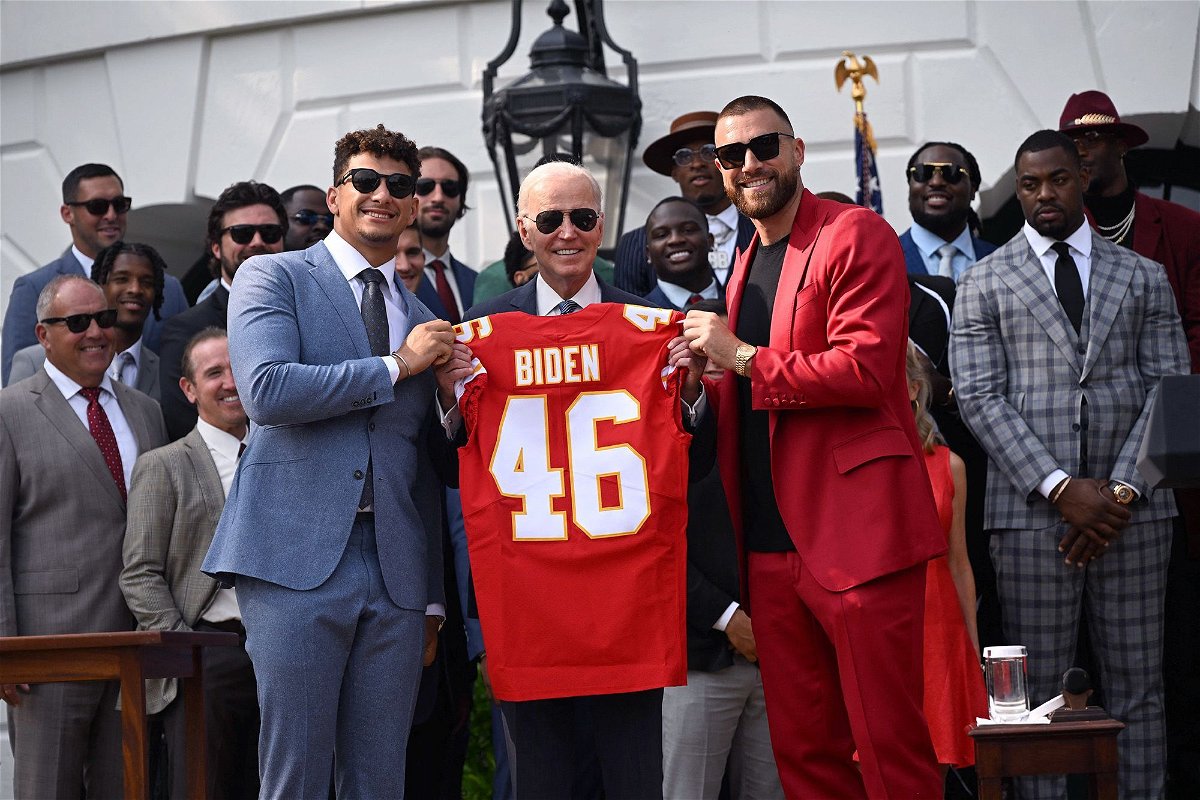 <i>Andrew Caballero-Reynolds/AFP/Getty Images via CNN Newsource</i><br/>Kansas City Chiefs tight end Travis Kelce and quarterback Patrick Mahomes present President Joe Biden with a jersey during a celebration for the Kansas City Chiefs last year.