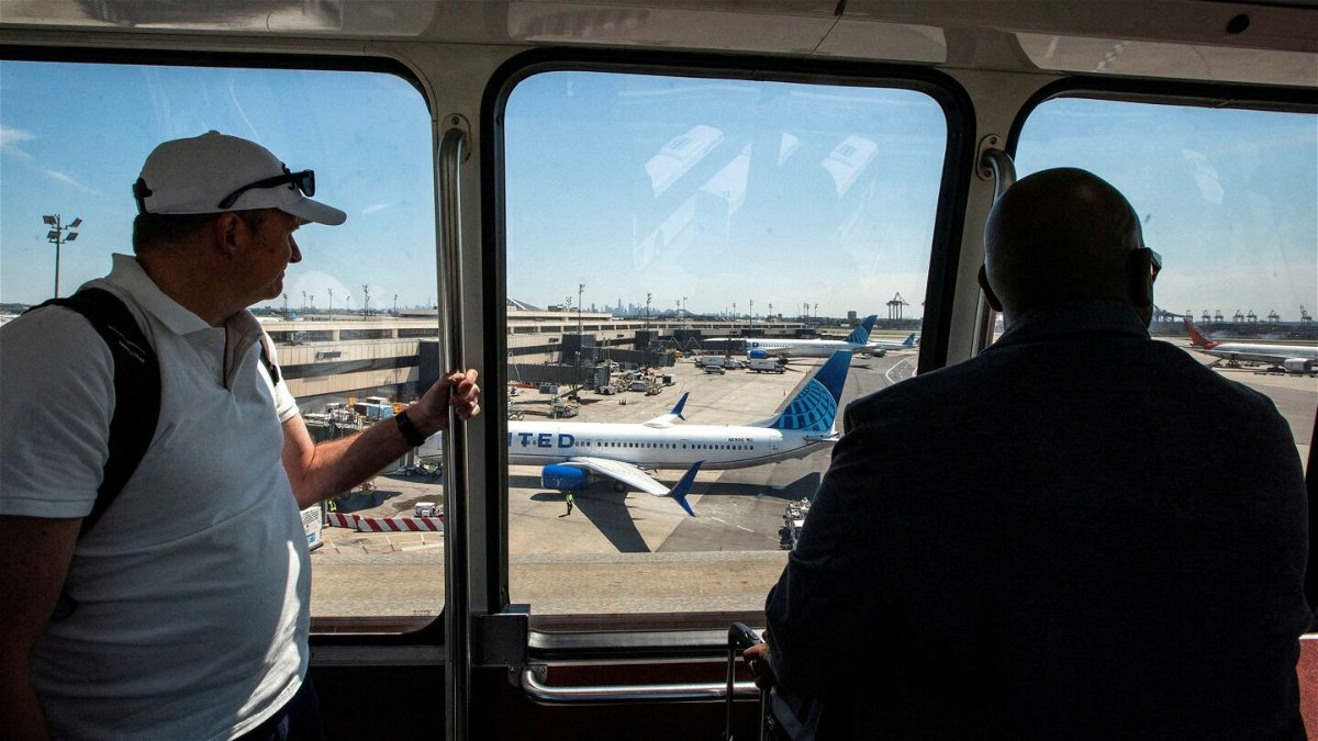 <i>Eduardo Munoz/Reuters via CNN Newsource</i><br/>Travelers arrive to the Newark Liberty International Airport during the Memorial Day weekend in Newark