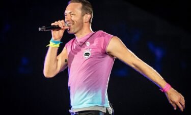 Chris Martin performs in 2023. Martin made news recently by picking up a fan on the way to a music festival.
