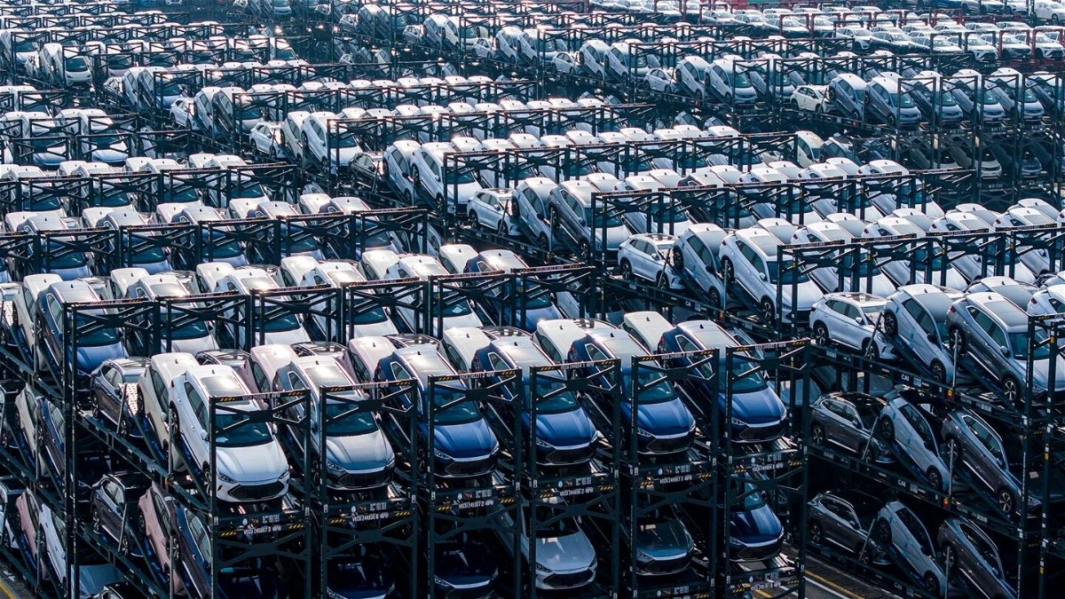 <i>STR/AFP/AFP/Getty Images via CNN Newsource</i><br/>BYD electric cars are seen here waiting to be loaded onto a ship. BYD overtook Tesla at the end of last year as the top seller of electric vehicles on the planet.