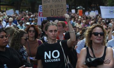 Demonstrators take part in a national rally against violence against women in Sydney on April 27.