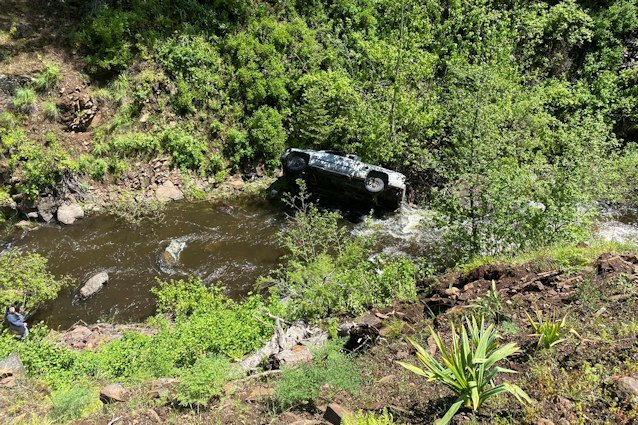 In this image provided by the Baker County Sheriff's Office, a vehicle is seen after it went into an embankment on U.S. Forest Service Road 39 on June 3.