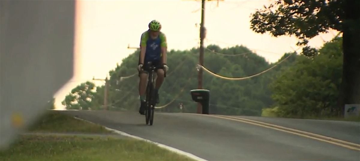 <i>WXII via CNN Newsource</i><br/>Lewisville doctor Steve Bissette put out a house fire while cycling to work.