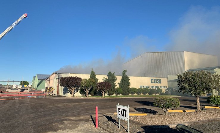 Smoke billows from fire Monday evening at Central Oregon Seeds Inc. in Madras