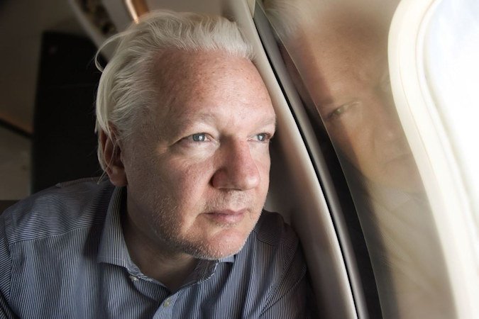 A photo of Julian Assange shared by Wikileaks on X, with a caption that reads, 