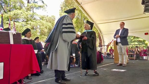<i>KPIX via CNN Newsource</i><br/>Virginia Hislop received her master's academic hoop and her diploma.