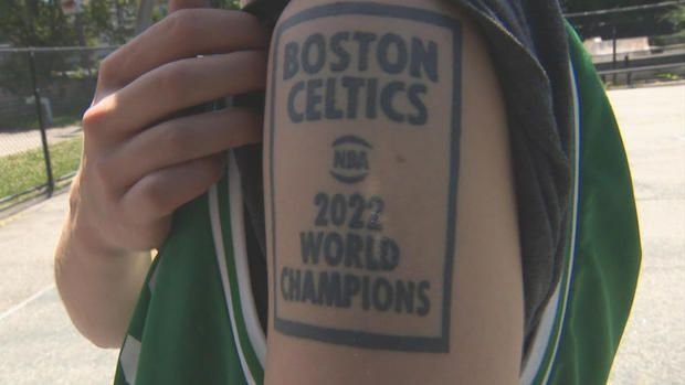 <i>WBZ via CNN Newsource</i><br/>Jack Bienvenue's inaccurate 2022 Boston Celtics World Champions tattoo.