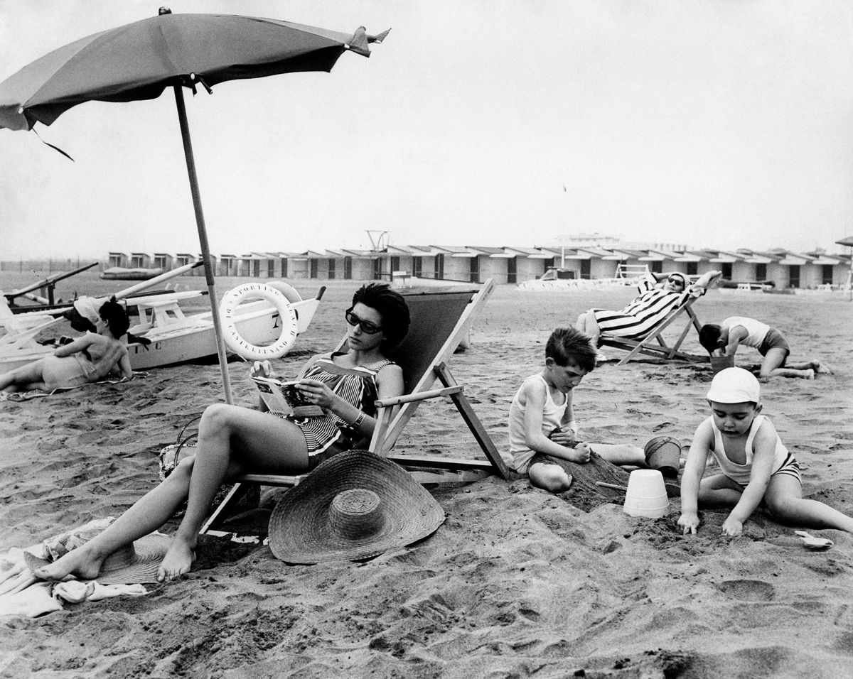 <i>Mondadori Portfolio/Getty Images via CNN Newsource</i><br/>The association between summer and light reading came as summer travel became more accessible for the middle classes