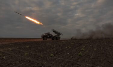Ukrainian forces launch a rocket toward Russian positions in the Kharkiv region