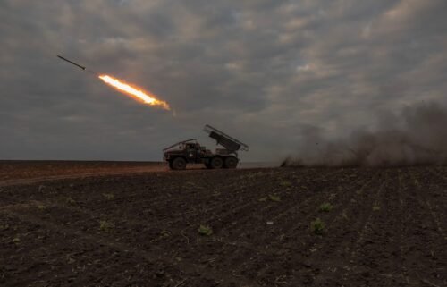 Ukrainian forces launch a rocket toward Russian positions in the Kharkiv region