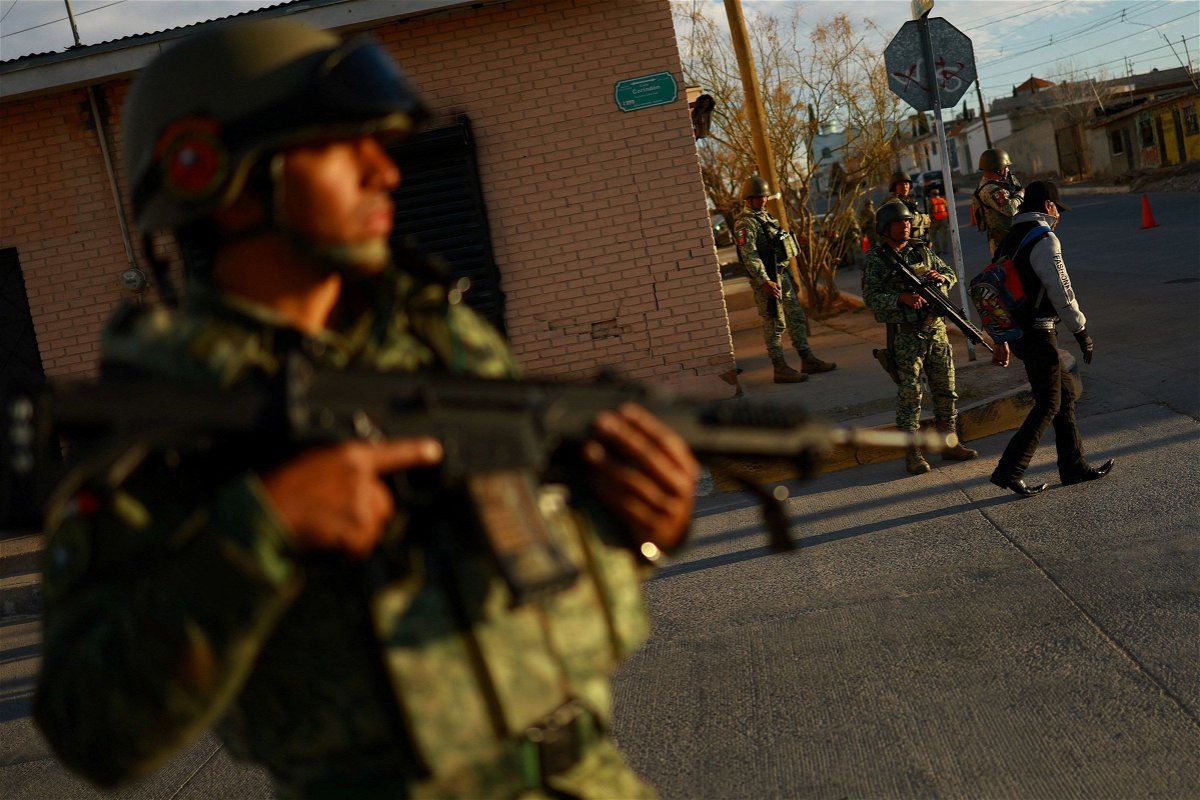 <i>Jose Luis Gonzalez/Reuters via CNN Newsource</i><br/>Mexican Army and National Guard members take part in 