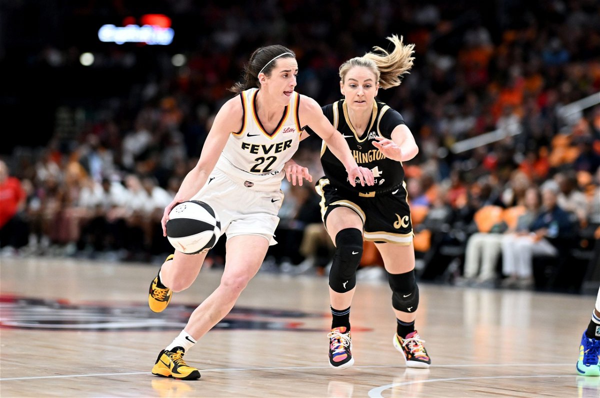 <i>Greg Fiume/Getty Images via CNN Newsource</i><br/>Caitlin Clark handles the ball in the first quarter against Karlie Samuelson.
