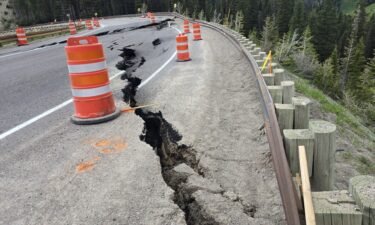 Cracks in the roadway on Teton Pass are seen on Friday
