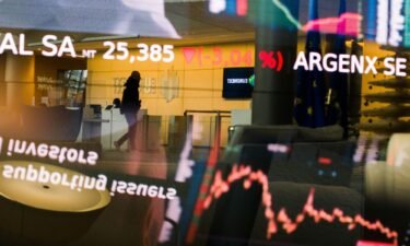 Stock prices are displayed in the lobby of the Euronext NV stock exchange in Paris in December 2022. France’s CAC 40 index
