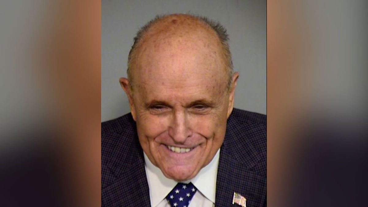 <i>Maricopa County Sheriff's Department via CNN Newsource</i><br/>Rudy Giuliani's mug shot taken in Phoenix
