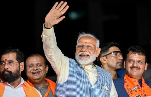 India's Prime Minister Narendra Modi waves during campaigning in Mumbai on May 15. Modi has declared victory in the national elections on June 4.