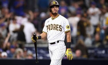 Tucupita Marcano walks back to the dugout after striking out during the San Diego Padres' game against the New York Mets in June 2021. Marcano has been banned for life by Major League Baseball for betting on baseball games.