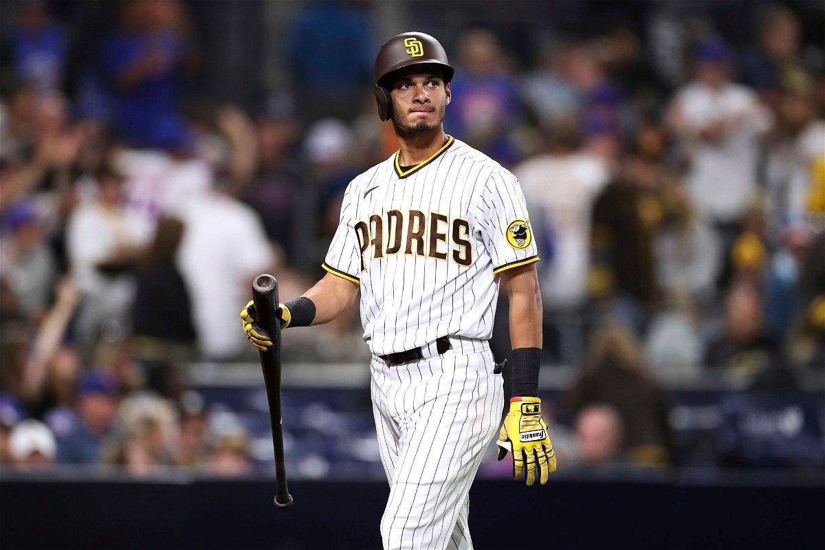 <i>Derrick Tuskan/AP via CNN Newsource</i><br/>Tucupita Marcano walks back to the dugout after striking out during the San Diego Padres' game against the New York Mets in June 2021. Marcano has been banned for life by Major League Baseball for betting on baseball games.