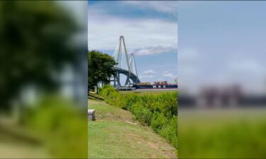 A still picture taken from a video shows a container ship heading toward the Arthur Ravenel Jr. Bridge in Mt. Pleasant