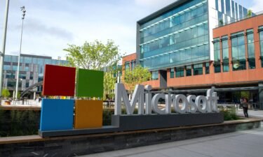 The Microsoft logo can be seen at the headquarters of the software company. The Federal Trade Commission is investigating a recent Microsoft deal with artificial intelligence startup Inflection.