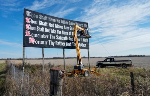 A group of Louisiana parents and civil rights organizations are suing the state over its new law that requires all public classrooms to display the Ten Commandments. Workers seen repainting a Ten Commandments billboard off of Interstate 71 on Election Day near Chenoweth