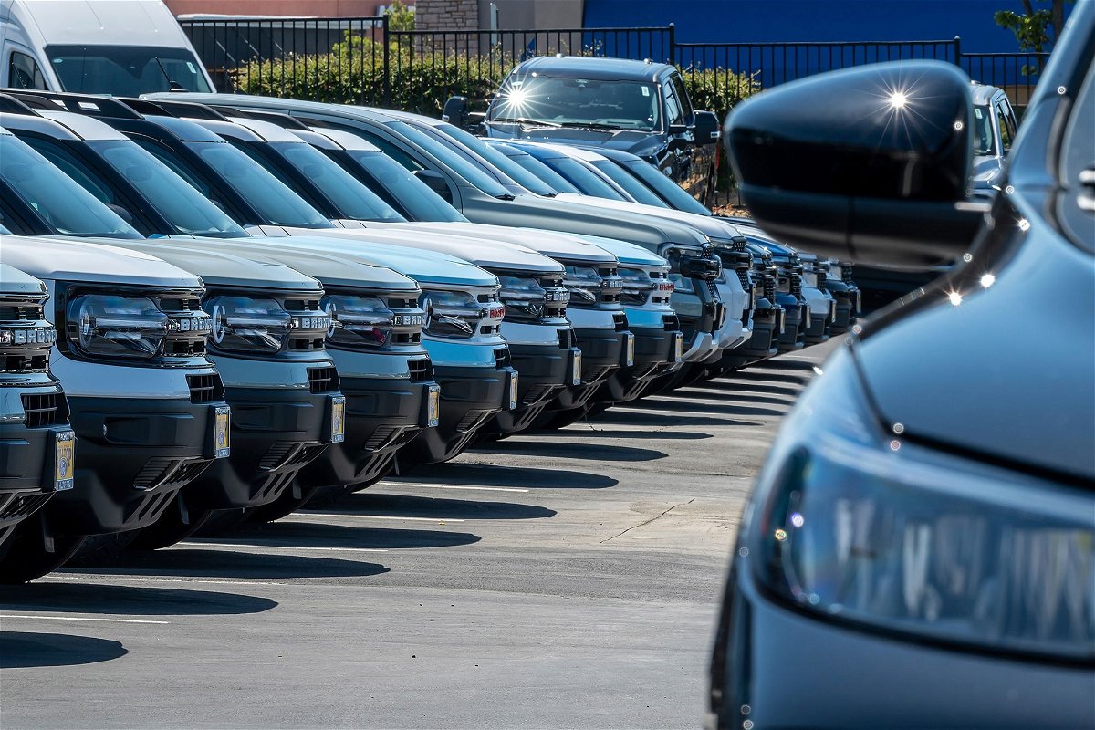 <i>David Paul Morris/Bloomberg/Getty Images via CNN Newsource</i><br/>Vehicles for sale at a dealership in Richmond