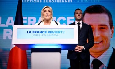 Marine Le Pen and Jordan Bardella address a crowd of RN supporters in Paris