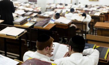 Ultra-Orthodox Jewish men study Torah in a yeshiva on June 2 in Bnei Brak