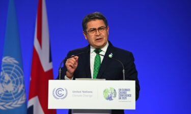 Former Honduran President Juan Orlando Hernández speaks at the COP26 climate change conference in Scotland in November 2021. Juan Orlando Hernandez has been sentenced to 45 years in prison and given an $8 million fine by a US judge for drug trafficking offenses.