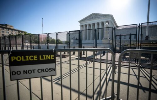 Security fencing surrounds the U.S. Supreme Court in June 2022 in Washington