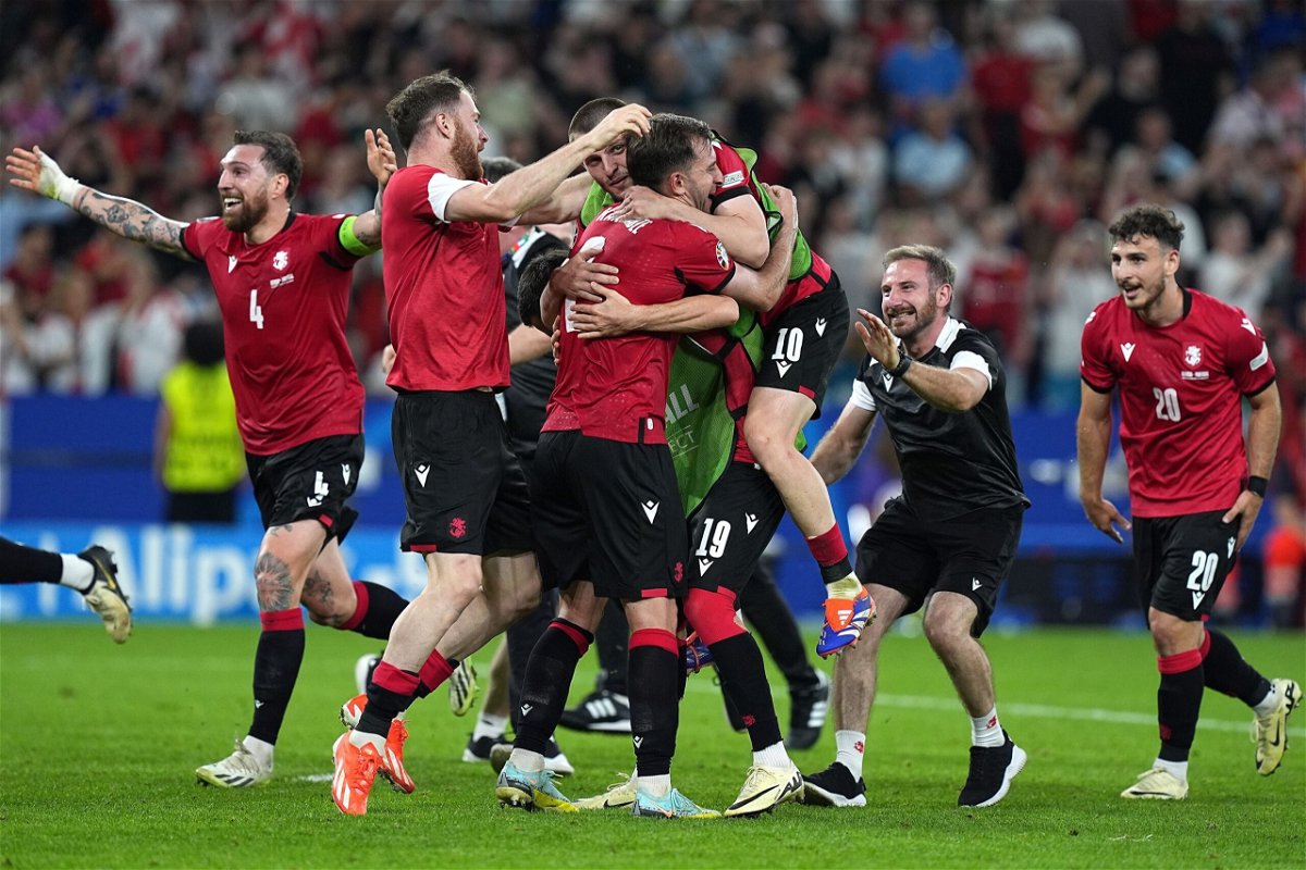 <i>Emin Sansar/Anadolu/Getty Images via CNN Newsource</i><br/>Georgia celebrates its victory after beating Portugal in its final Group F game.