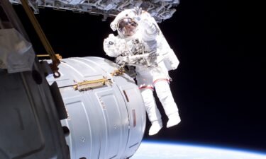 NASA astronaut Jeff Williams is seen during a 2006 spacewalk outside the International Space Station.