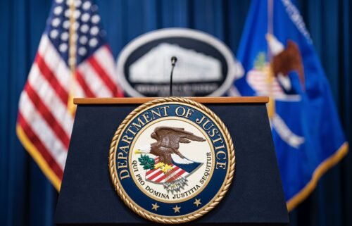 Seal of the US Department of Justice before a news conference in Washington