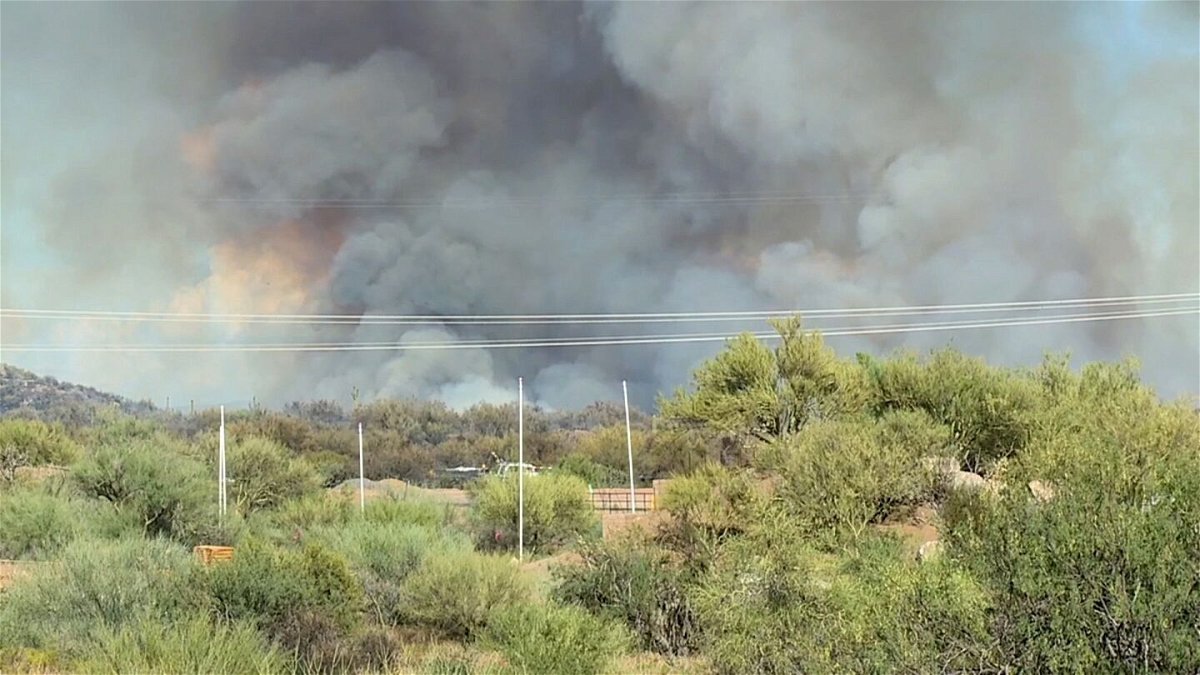 <i>KNXV via CNN Newsource</i><br/>The Boulder View Wildfire burns in Arizona on Thursday